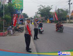 Personel Pos Pam Marelan Atur Lalu Lintas untuk Cegah Kemacetan Libur Nataru