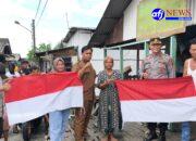Polres Pelabuhan Belawan Bagikan Bendera Merah Putih untuk Semarakkan Bulan Kemerdekaan