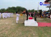 Berbagi Peran Dengan Camat, Danramil 10/Tanjung Medan Jadi Irup Upacara Penurunan Bendera HUT Ke-80 RI Tahun 2025