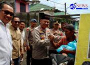 Kapolres Pelabuhan Belawan Beri Bantuan Sembako untuk Warga Terdampak Banjir Rob