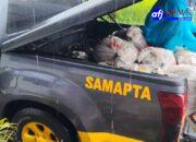 Polres Pelabuhan Belawan dan Warga Bahu-Membahu Perbaiki Tanggul Sungai Deli yang Jebol di Panah Hijau