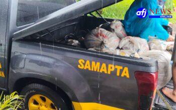 Polres Pelabuhan Belawan dan Warga Bahu-Membahu Perbaiki Tanggul Sungai Deli yang Jebol di Panah Hijau