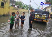 Polres Pelabuhan Belawan Pantau Situasi Banjir dan Salurkan Bantuan kepada Warga Terdampak