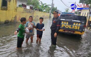 Polres Pelabuhan Belawan Pantau Situasi Banjir dan Salurkan Bantuan kepada Warga Terdampak