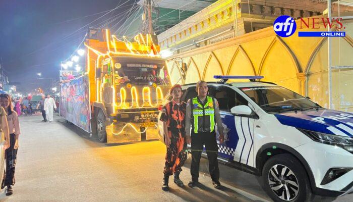 Polres Pelabuhan Belawan dan Polsek Belawan Amankan Pawai Obor Sambut Tahun Baru Islam 1 Muharram 1448 H